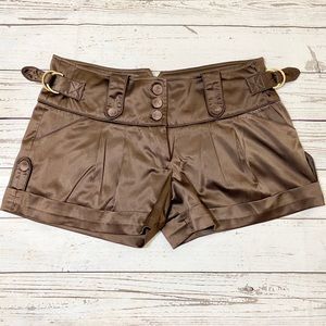 Brown satin like Sele shorts.